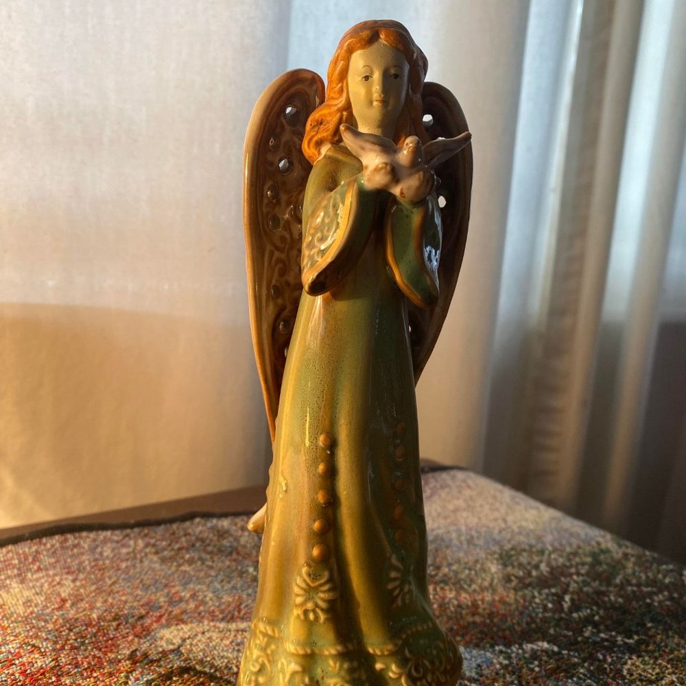 Ceramic Embossed Angel Holding a Dove